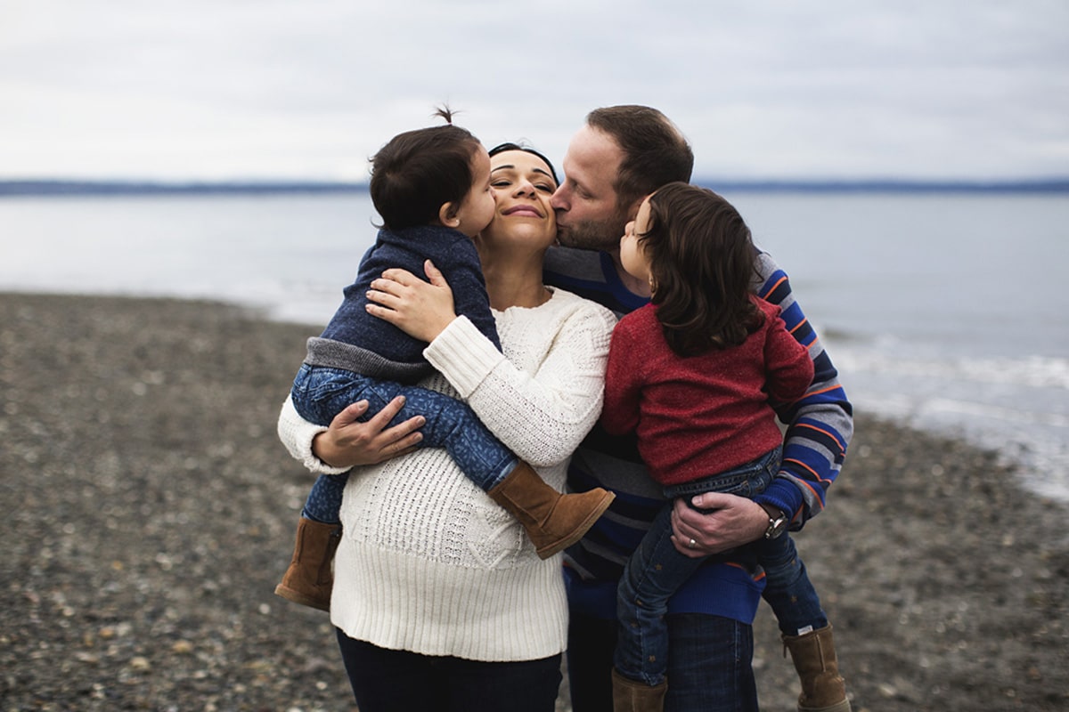 family-hugging-and-kissing-portrait-karter-schools