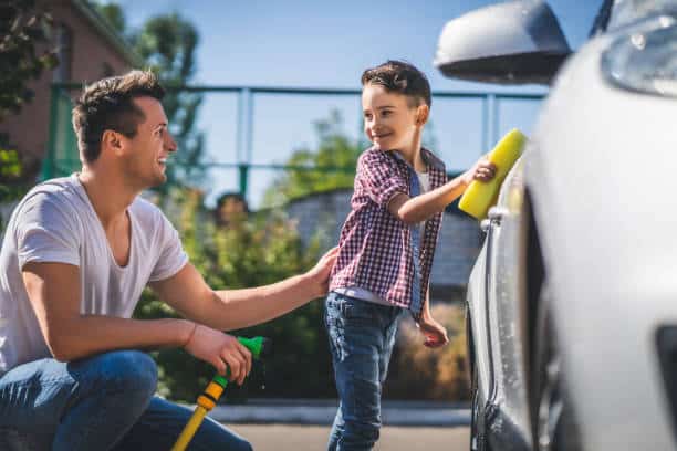 The-daddy-and-his-son-cleaning-the-car-karter-school